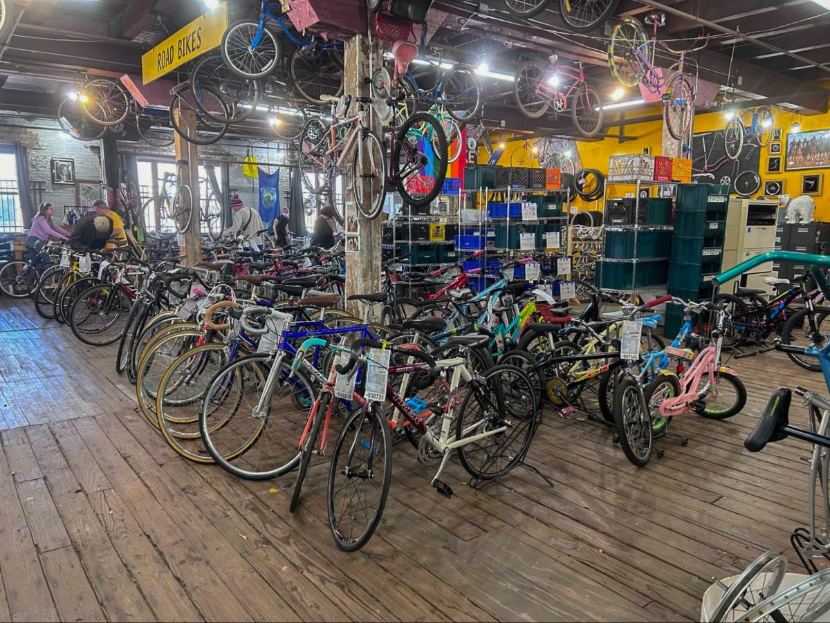 Customers+stroll+through+the+crowded+aisles+of+bikes+at+the+non-profit+store+Working+Bikes.+Established+in+Chicago+25+years+ago%2C+their+mission+is+to+send+bikes+around+the+world+in+the+hopes+of+making+eco-friendly+transportation+available+for+communities+%2C+like+in+Africa+and+Latin+America%2C+that+depend+on+it.+Having+volunteered+there+when+she+was+in+high+school%2C+Katie+Clendenning%2C+the+service+and+learning+coordinator%2C+said+%E2%80%9CWorking+Bikes+is+a+really+interesting+organization+because+I+think+they+do+a+really+good+job+of+both+thinking+and+working+locally%2C+and+also+thinking+and+working+globally.%E2%80%9D++