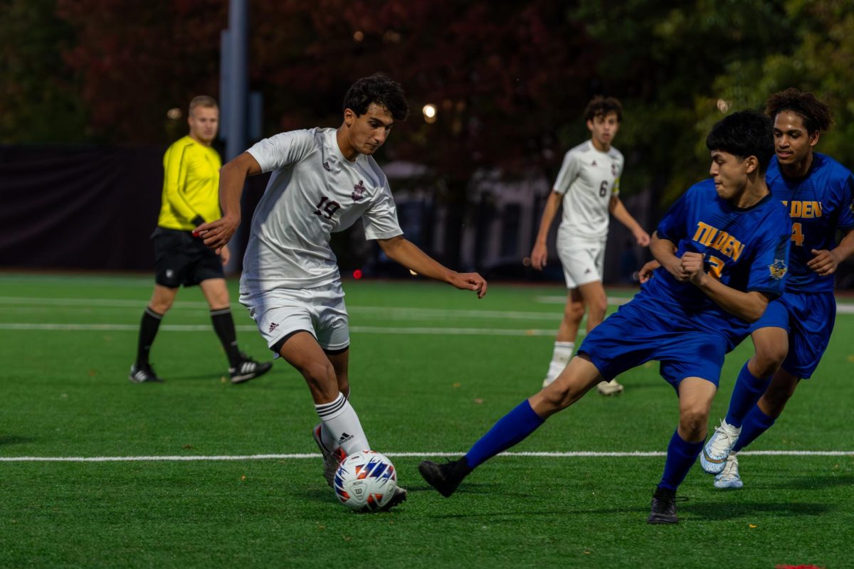 Ninth grader Alex Yamini defends the ball at the regional semifinal game against Tilden High School on Oct. 18 at Jackman Field. U-High won 9-0.