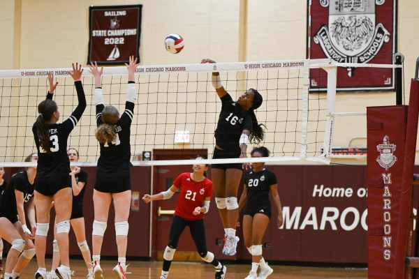 Sophomore Kylie Carter spikes the ball during the girl's varsity volleyball game on Oct.10 against Morgan Park Academy. The team's season concluded with a loss of 25-21, 25-15 to Wilmington High School on Nov. 5 at the Manteno Semifinal match. 