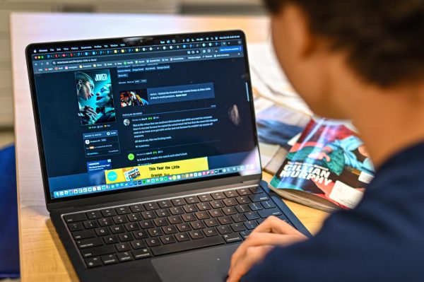 A student scrolls through Letterboxed reviews for "Joker: Folie à Deux," which came out on Oct. 4. Letterboxd is a website where people can write, share and read reviews to discuss their favorite movies, as well as get help determining what should be next on their watchlist. 