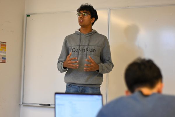 During a Model UN practice at lunch, sophomore Arjun Sawhney prepares for the Brown University conference. The Model UN team won best small delegation at Brown, and they won best medium delegation in a conference held at St. Ignatius College Prep.