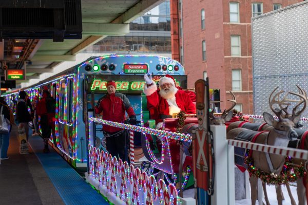 SANTA COMES EARLY. Every year the CTA decorates one of their trains as “Santa’s Express” with a Santa and reindeer, and elves as dedicated conductors to raise money for food baskets. 