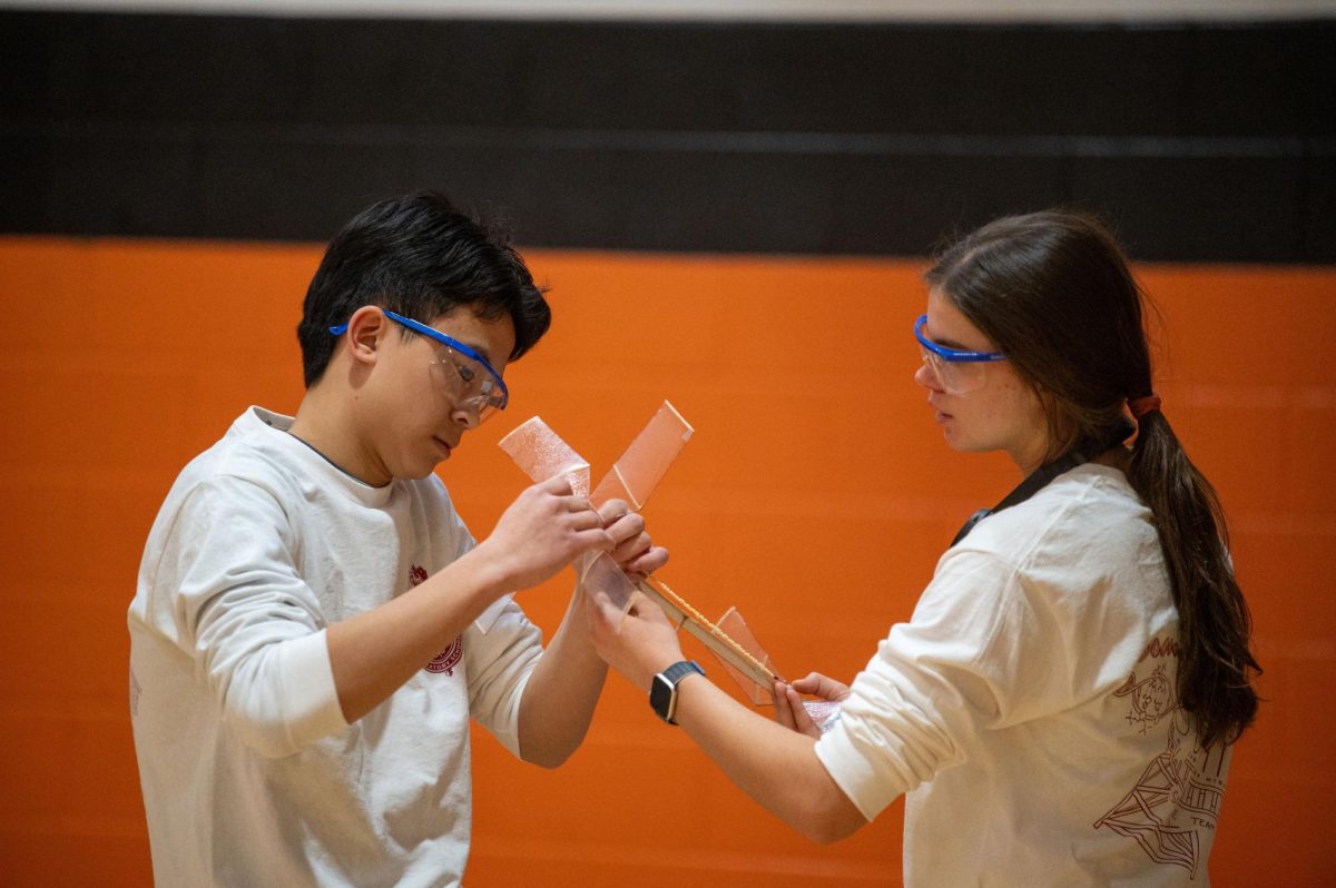 Sophomore Austen Wu and senior Maxine Hurst compete at the Jan. 25 Science Olympiad competition at Lake Central High. The team used this competition as an opportunity boost team spirit and evaluate how to move forward in the season.