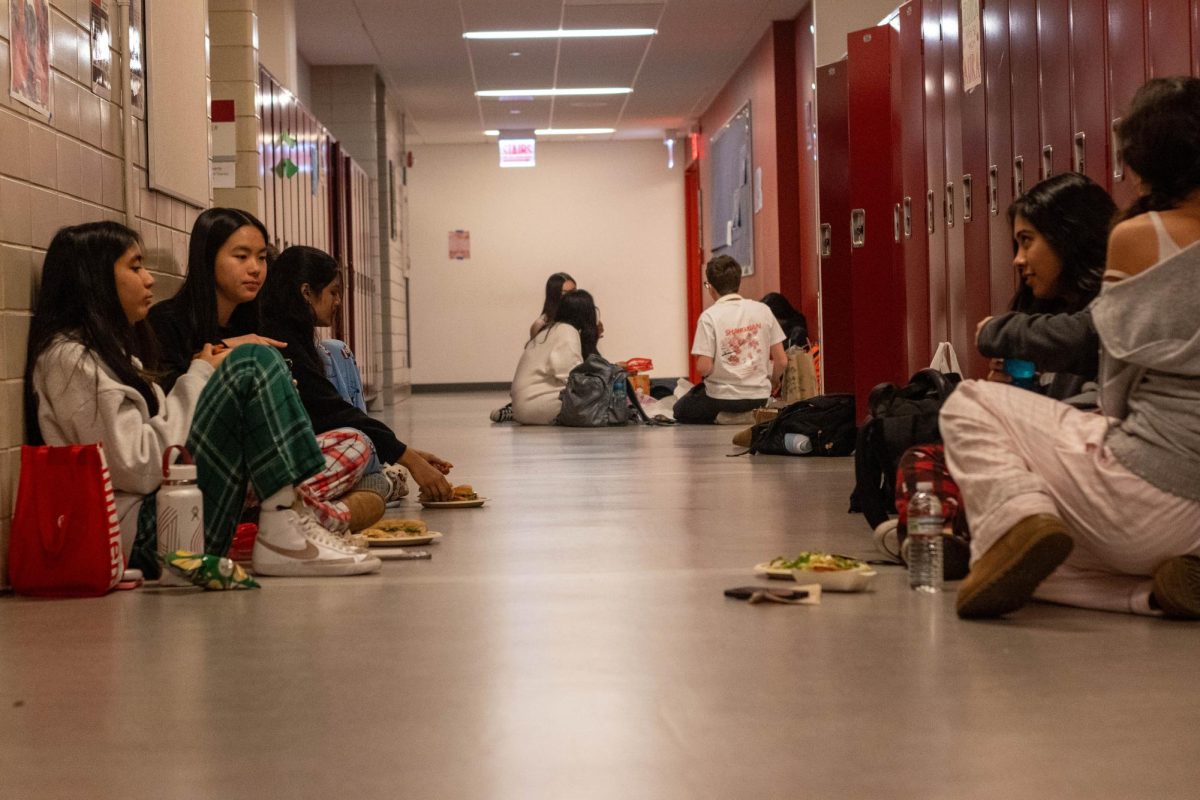 Students spend lunch period relaxing, socializing outside of cafeteria