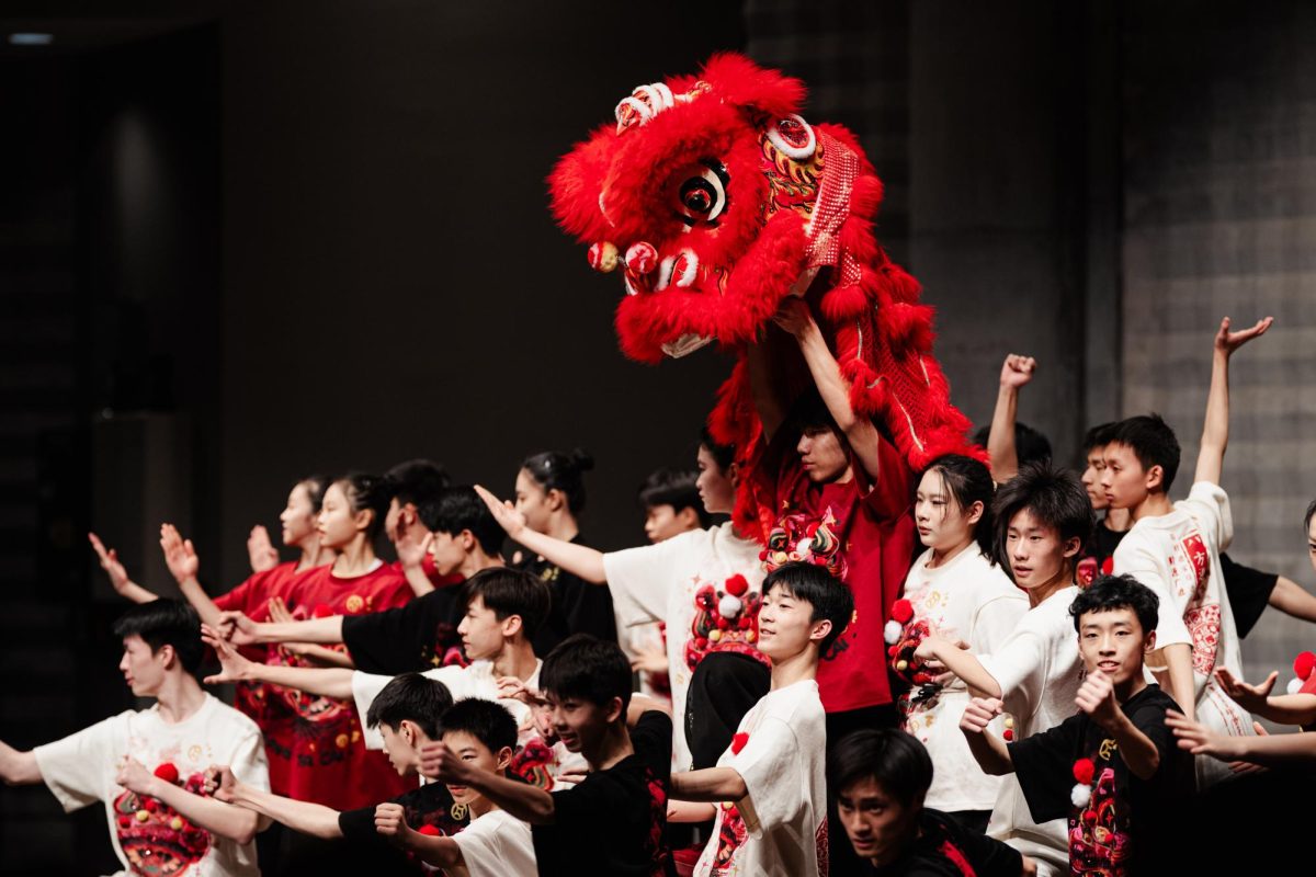 Students from the art troupe of RDFZ, the high school affiliated with Renmin University of China, perform with a traditional dragon decoration. Lab’s Chinese Families and Friends Affinity Group hosted a Lunar New Year celebration on Sunday, Feb. 2, from 4-5 p.m.
