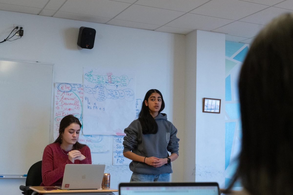 During a Jan. 27 meeting, senior Helen Kraemer listens as sophomore Taara Sajdeh practices for an upcoming Model United Nation team conference. At the Harvard MUN conference Jan. 31 to Feb. 2, two-thirds of the team won awards.