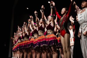 RDFZ’s dance, aerobics, martial arts and boy’s dance teams smile during the last moments of the “Youth of the Lion Dance,” one of the most common Chinese dances. This Lunar New Year’s animal was the snake, a symbol of good luck, rebirth and regality. 
