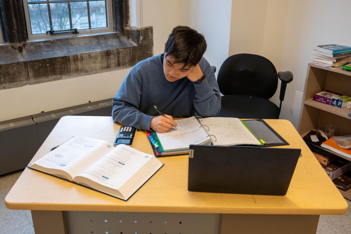 Sophomore Jimmy Yu studies for one of his two math classes, Discrete Mathematics and Statistics and Accelerated Pre-Calculus/Calculus A. Many U-High students are doubling up and testing out of math classes to reach more advanced courses. Motivations vary, such as nurturing a passion, finding a challenge or strengthening their college applications.