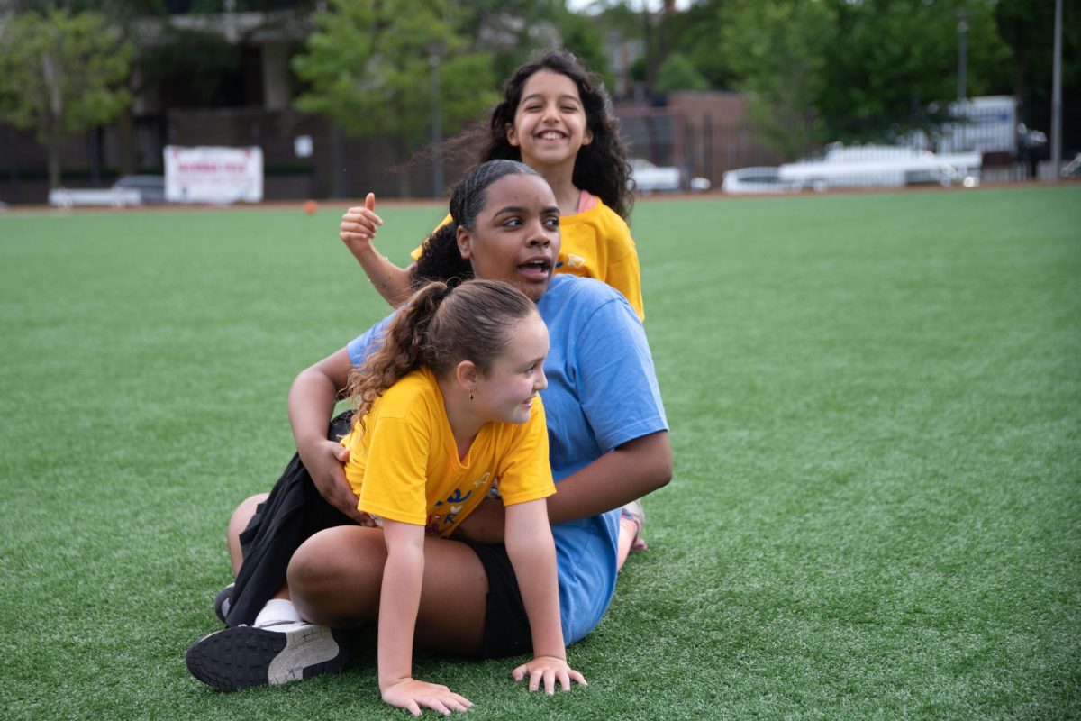 Ninth grader Madison Vicknair plays with Adventure Kids campers in 2024. Starting this summer, Adventure Kids will be removing eighth grade and ninth student counselors, changing leadership and will be rebranded. 