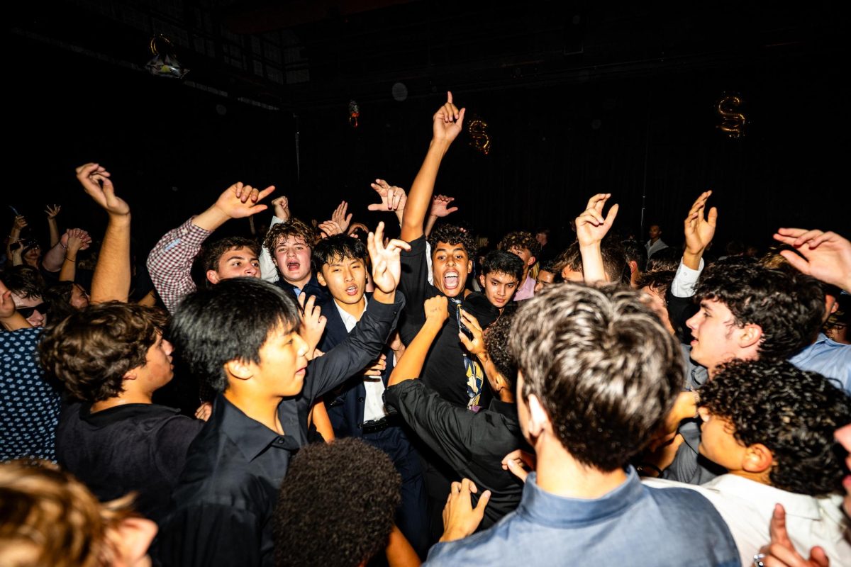 DANCING UP A STORM. U-High students dance in the Sherry Lansing Theater during the homecoming dance on the evening of Sept. 20. This year’s homecoming dance was themed around “Diamond Heist” and saw a record-breaking attendance of 581 students, which included guests and exchange students from Argentina and Germany. 