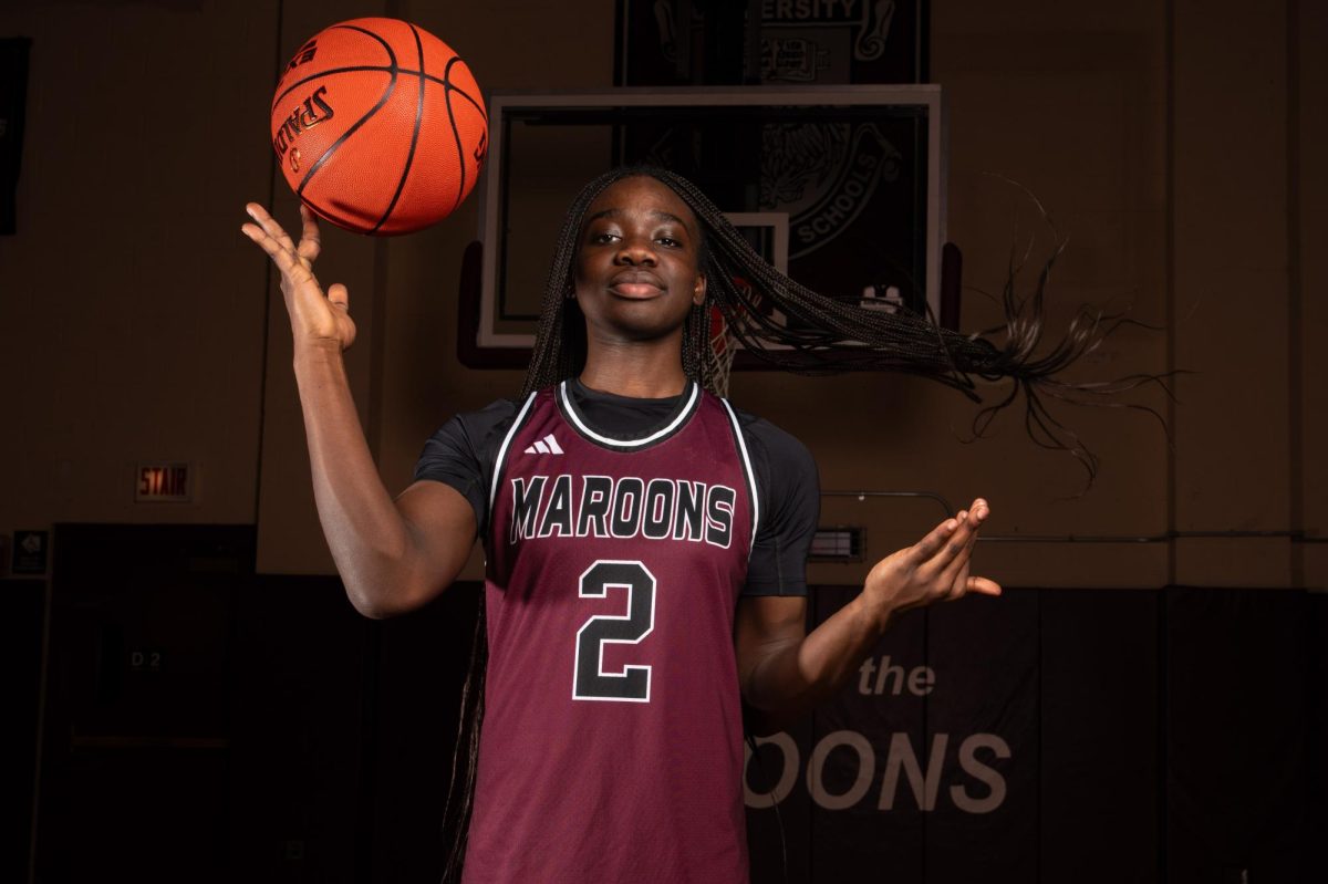 BACK IN ACTION. After a torn meniscus and sprained ACL that kept her from playing on the basketball team her sophomore season, junior Nanak Ofori-Mante has returned to the court with
a new sense of determination and leadership.