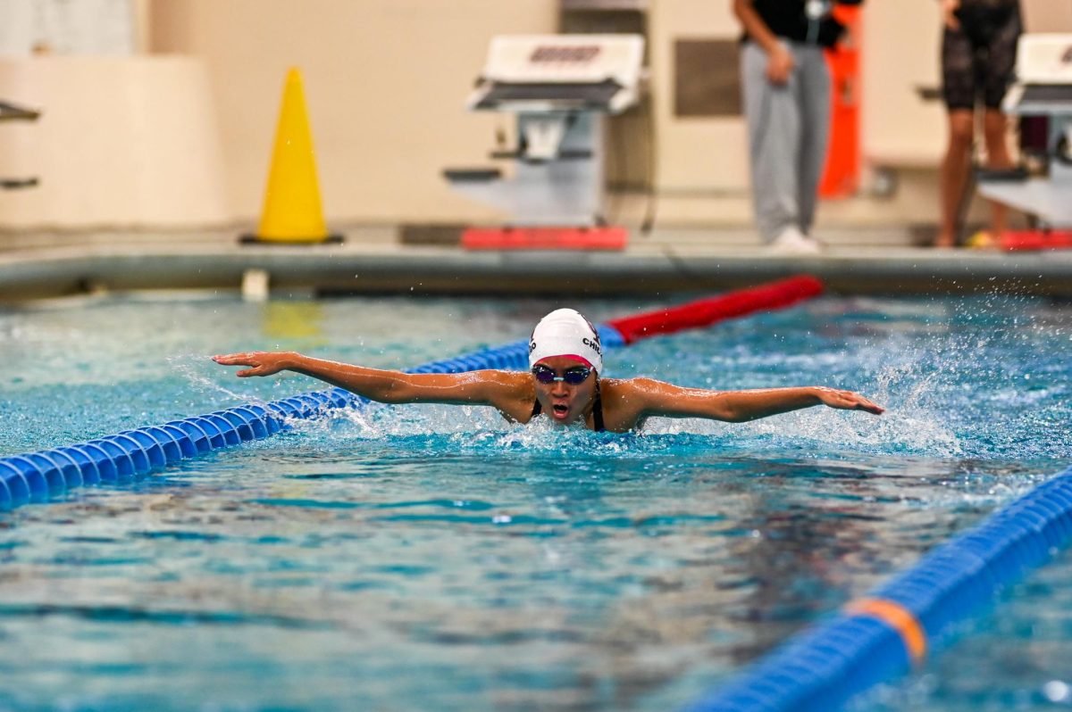 NOVEMBER — Chlorine Showdown. Kayla Monterola competes in the 100-yard butterfly race at the IHSA girls swimming sectional meet at the University of Illinois at Chicago on Nov. 8. 