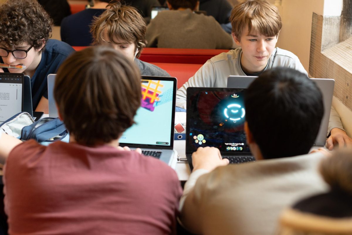 The recent phone policy, which limits the use of phones, has caused people to find a different device to play video games on, leading them to play games on their computers during lunch and free lab periods as a source of entertainment and socialization.
