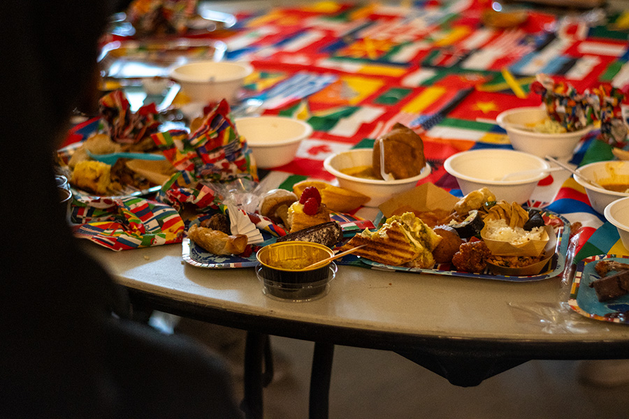 LEFTOVER LUNCH. Leftover food scraps and used serving items lie on the table in the aftermath of International Day. Unlike regular lunch periods, during ArtsFest, students were given one hour, from 12:10 p.m to 1:10 p.m., to eat lunch. Photo by Xander Feigenbaum.