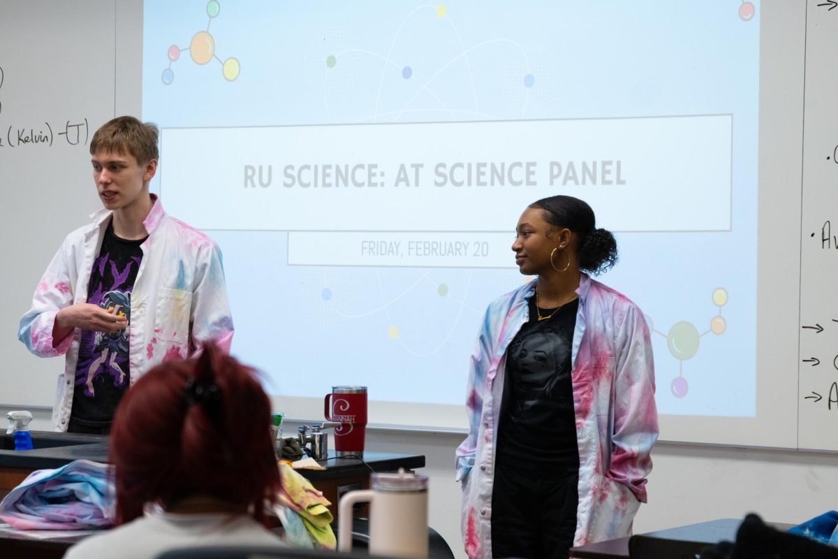 RU Science student leaders Giovanni Nicolai and Savannah Woodson present to students about AT Science Shadow Week as part of an RU Science panel.