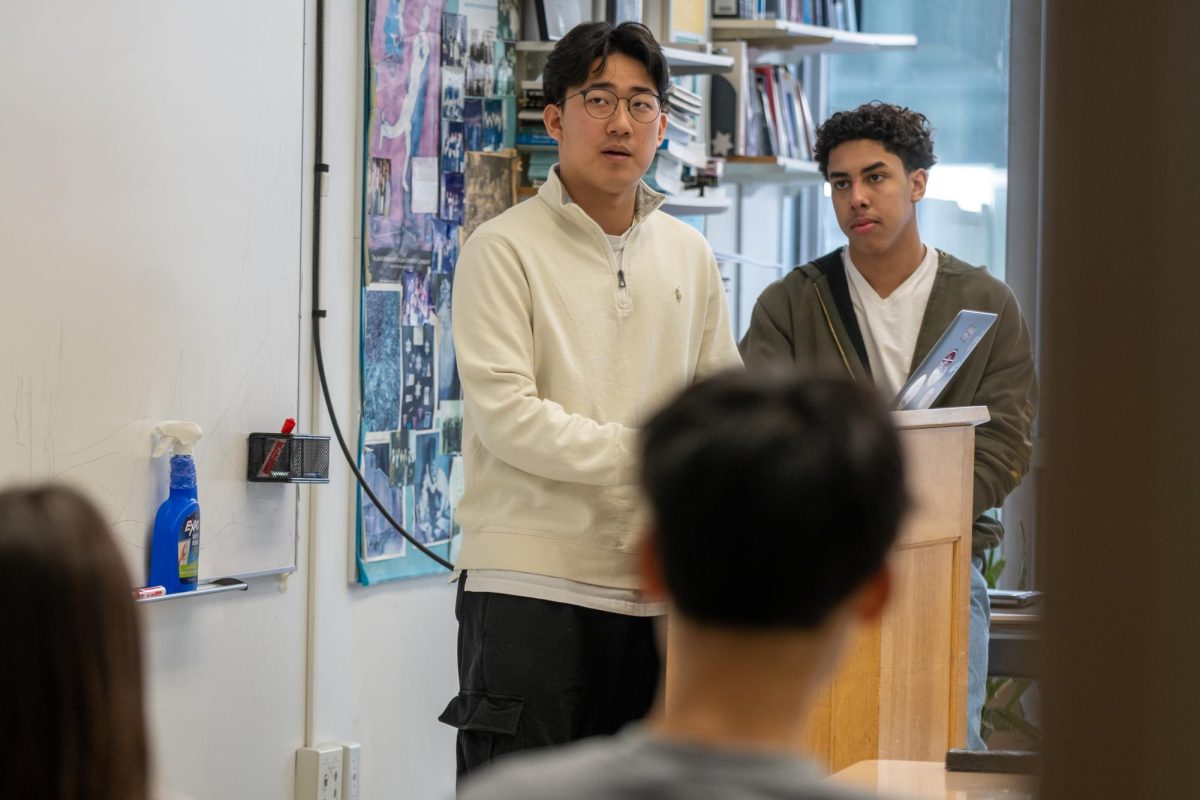 All-School President Daniel Chang stands alongside All-School Vice President Ty Quiles during a Feb. 9 Student Council meeting. Student council has various bills currently underway and also broke records at Homecoming this year. 