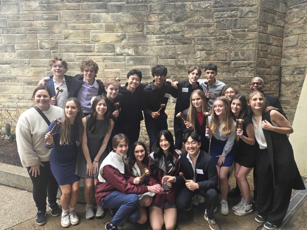 After receiving their awards, the Model UN Team stands together. The team won third overall for the third year in a row.  