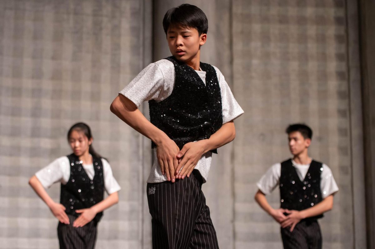 SYNCHRONIZED STEPS. His dark jacket glimmering in the auditorium lighting, Gao Yibin dances as part of a Lunar New Year routine, performed by exchange students from the RDFZ, Lab’s partner school in China. This school, affiliated with the Renmin University of China, received amazed cheers and enthusiastic applause throughout the entire performance. 