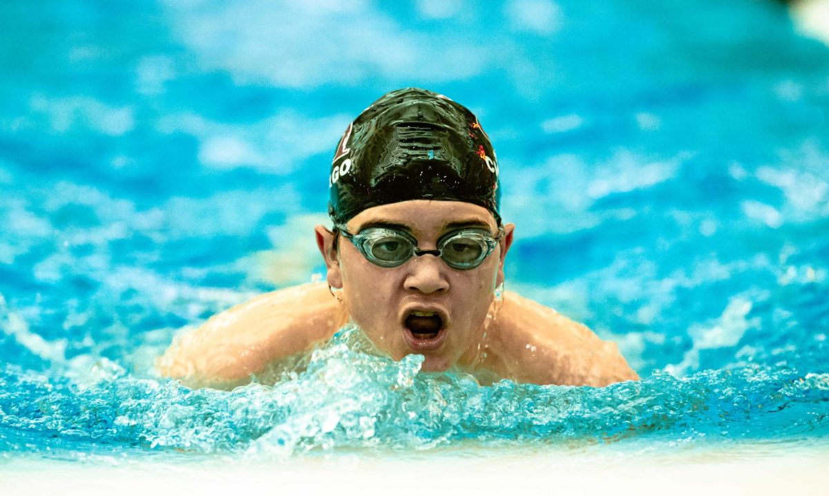 Ninth grader Johann Hitsch swims at the Jan. 28 quad meet against De La Salle, Mt. Carmel and DePaul Prep.