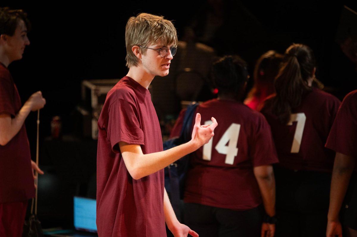 PRACTICED PREP. Senior Whit Waterstraat rehearses his lines between shows. The Student Experimental Theater performances ranged in topic from friendly puppetry to gothic horror. Here, Whit is practicing for a scene about a girls soccer team, an excerpt taken from “The Wolves” by Sarah DeLappe. 
