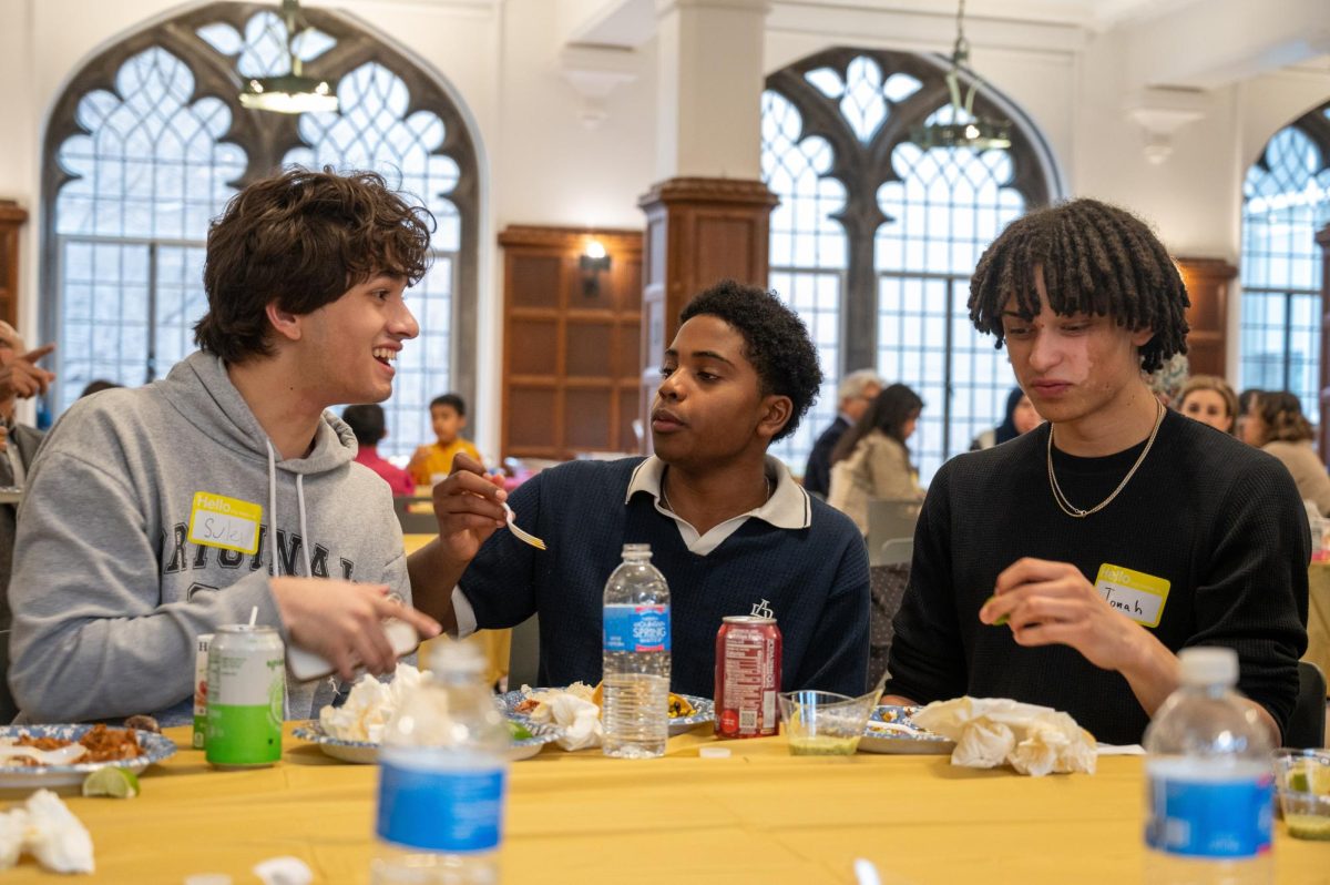 Suleiman Sufi, Zeidan Rowe and Jonah Austen finish their meal at MSA's annual Eid dinner. The event was hosted on March 26, and invited the Lab community to observe the end of Ramadan and honor MSA's senior members.
