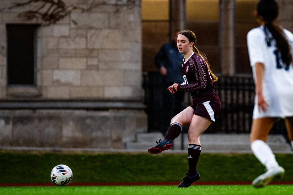 During a game against Acero Soto on April 7, senior Isolde LaCroix-Birdthistle clears the ball. 