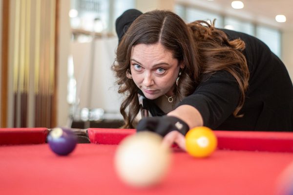 LINING UP THE SHOT. Math teacher Shelby Lunte is currently the co-captain of five different pool teams and has qualified for the APA’s Las Vegas tournament 7 times — including one qualification as an individual player.
