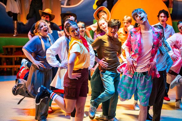 OPENING ACT. “The SpongeBob Musical” cast sings the musical’s opening number, “Bikini Bottom Day.” The musical was performed May 15-16, and was held in Sherry Lansing Theater. Sofia Ybarra, who played SpongeBob, said, “It was definitely the hardest role I’ve ever had, both in terms of the physical demands and the acting ones as well. Not only did I have to learn how to be a cartoon character with my voice and emotions, I also had to learn to embody one. On top of that, I was responsible for keeping the energy of the whole cast up and engaged. I wouldn’t have traded the role or the experience for the world, though.”
Photo by Elspeth LaCroix-Birdthistle