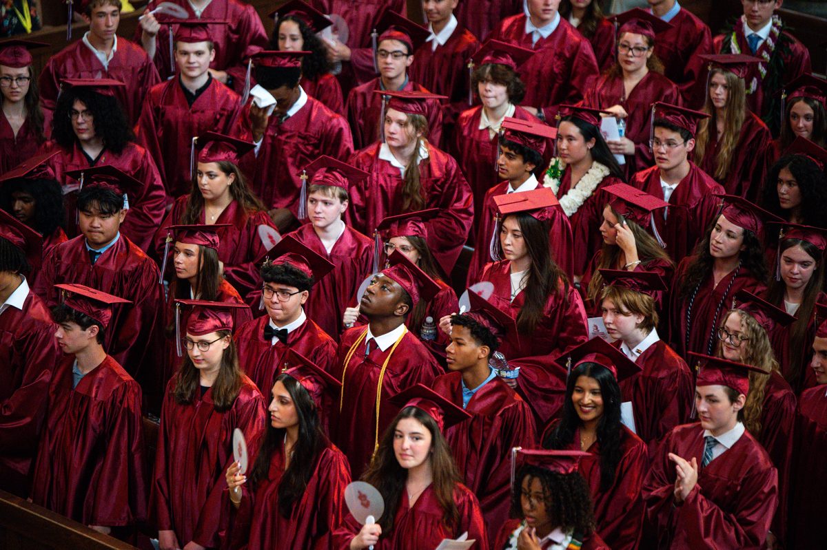THE MAROON SEA. The Class of 2026 floods Rockefeller Chapel on June 11 for the 122nd University of Chicago Laboratory Schools Commencement. Students held fans. Rockefeller Chapel was overrun with heat during the ceremony.
