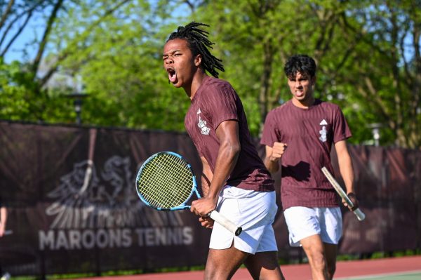 Yelling in celebration, sophomore Christopher Williams and junior Arjun Sawhney react after winning a point during a varsity tennis match against Lake Forest Academy on April 28. The pair qualified for state even though they were partners for the first time this year. “It was a very new feeling to play with one another,” Arjun said. “I think these matches where we started to feel out how to best play with each other were helpful.”