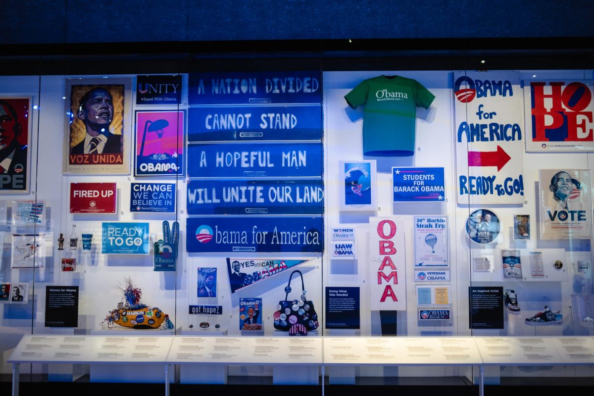 An exhibit in the Obama center displays various multimedia supporting Obama's 2008 campaign.