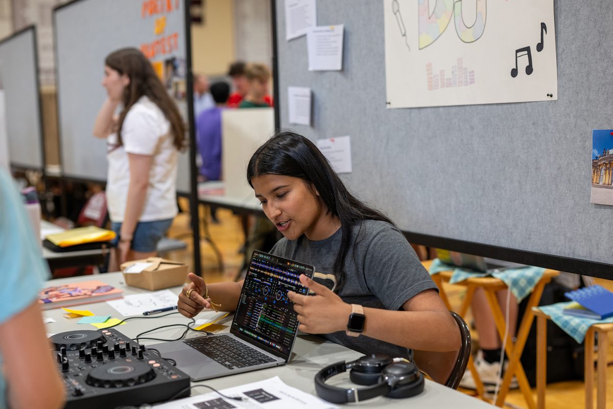DEXTEROUS DJ. Senior Vedika Dangi presents her May Project at the May Project exhibit on the afternoon of June 4. Vedika learned how to DJ over three weeks and played a set during the presentations. 