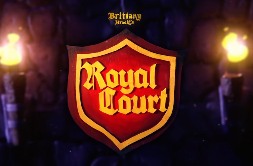 Squire! The YouTube logo of “Royal Court” is displayed at the introduction of every interview, where celebrities and cultural icons answer both ridiculous and serious questions about their lives, careers and passions. The show started in 2023, with country artist Orville Peck as the first guest. “I wanted to provide a talk show setting that rejects tradition & instead plays to my strengths and puts the guest at ease in a silly and carefree environment,” Brittany Broski wrote in the description of “Royal Courts” first episode.  